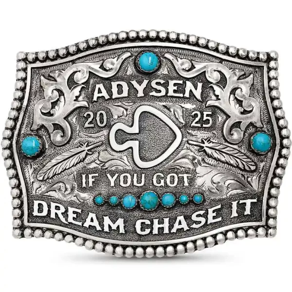 "The Blue Ridge Belt Buckle combines classic western style with a bold, modern & monochromatic flair. This Buckle is crafted on a hand-engraved, German Silver base with a light antique finish. It is detailed with a beaded edge, feather elements, 